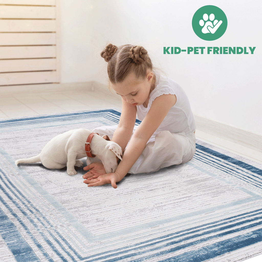 Marfi 6' x 9' Bordered Area Rug - Blue/Ivory