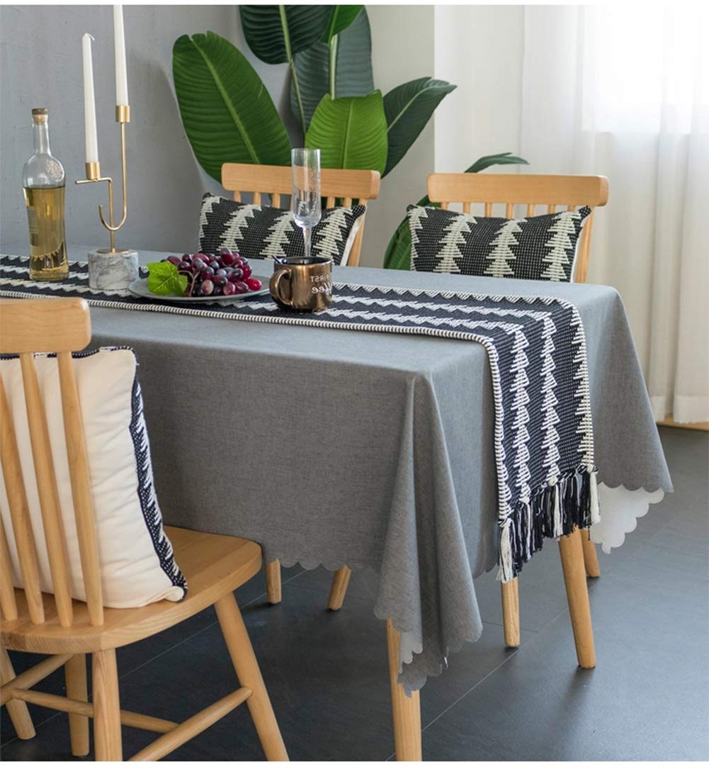 Fennco Styles Reversible Geometric Canvas Cotton Table Runner with Tassels – 14”W x 71”L Black & White Table Cover for Dining Table Décor, Banquets and Holidays