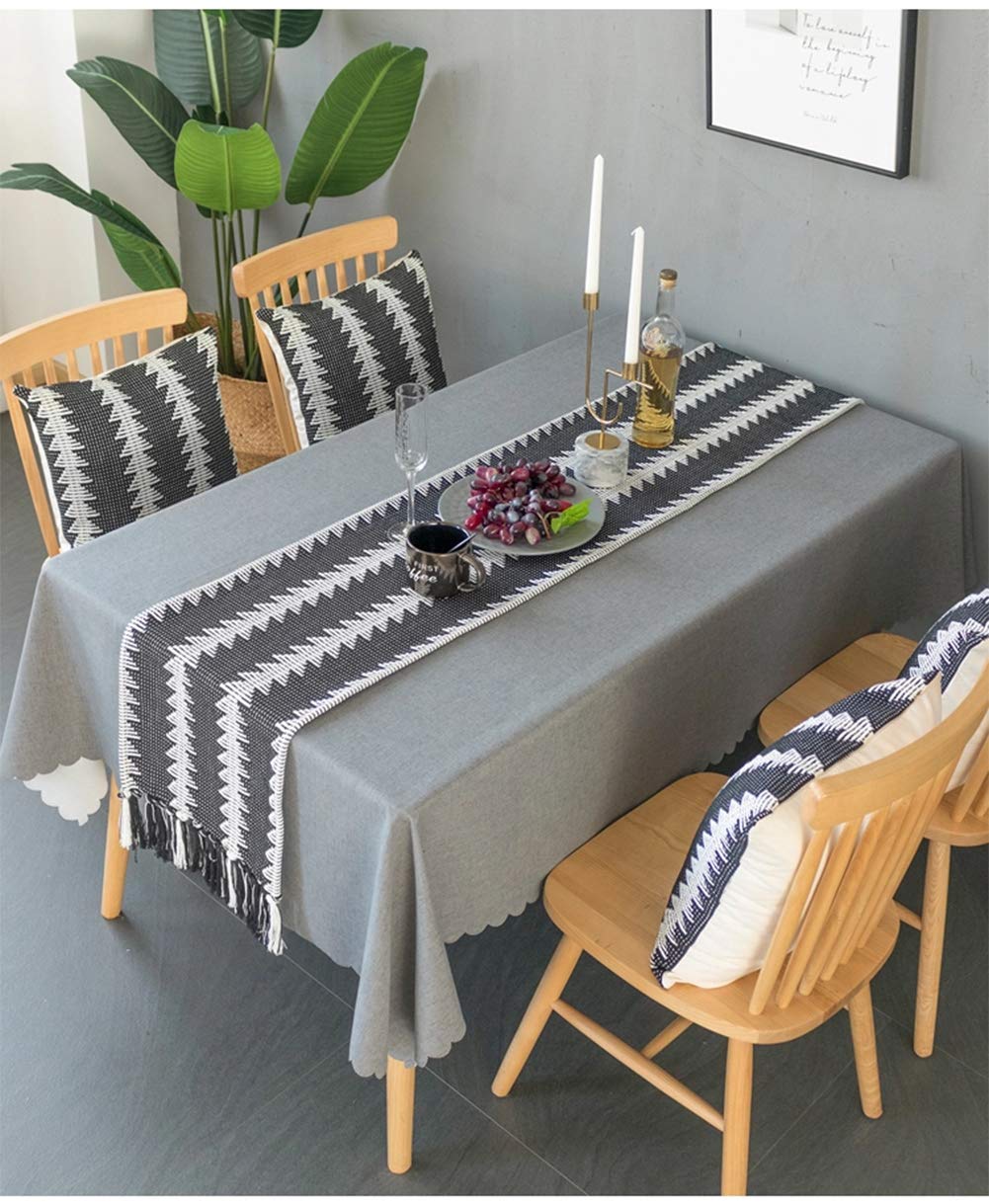 Fennco Styles Reversible Geometric Canvas Cotton Table Runner with Tassels – 14”W x 71”L Black & White Table Cover for Dining Table Décor, Banquets and Holidays