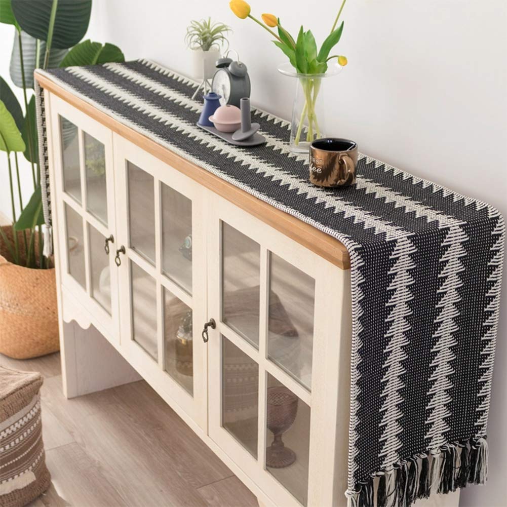 Fennco Styles Reversible Geometric Canvas Cotton Table Runner with Tassels – 14”W x 71”L Black & White Table Cover for Dining Table Décor, Banquets and Holidays