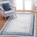 Marfi 6' x 9' Bordered Area Rug - Blue/Ivory