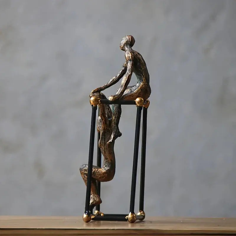 Abstract Two Figures Sculpture on Geometric Frame – Modern Bronze Iron Table Decor