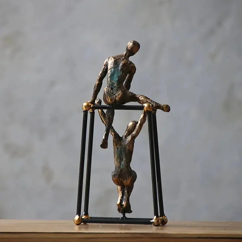 Abstract Two Figures Sculpture on Geometric Frame – Modern Bronze Iron Table Decor