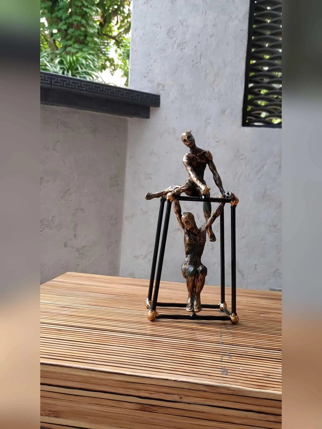 Abstract Two Figures Sculpture on Geometric Frame – Modern Bronze Iron Table Decor