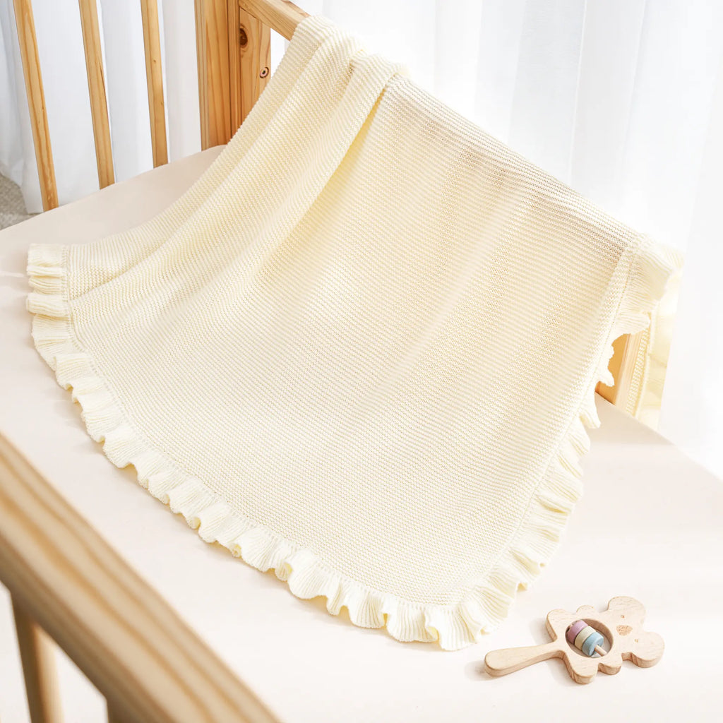 Ruffled Edge Knit Baby Blanket in Cream