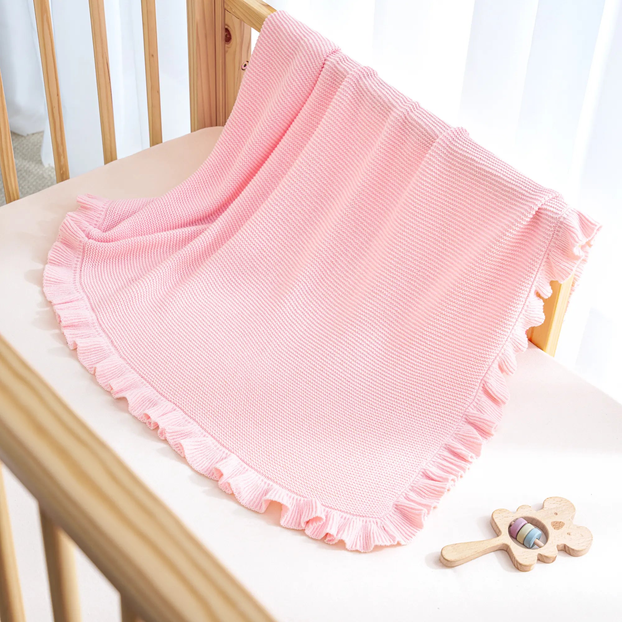 Ruffled Edge Knit Baby Blanket in Pink