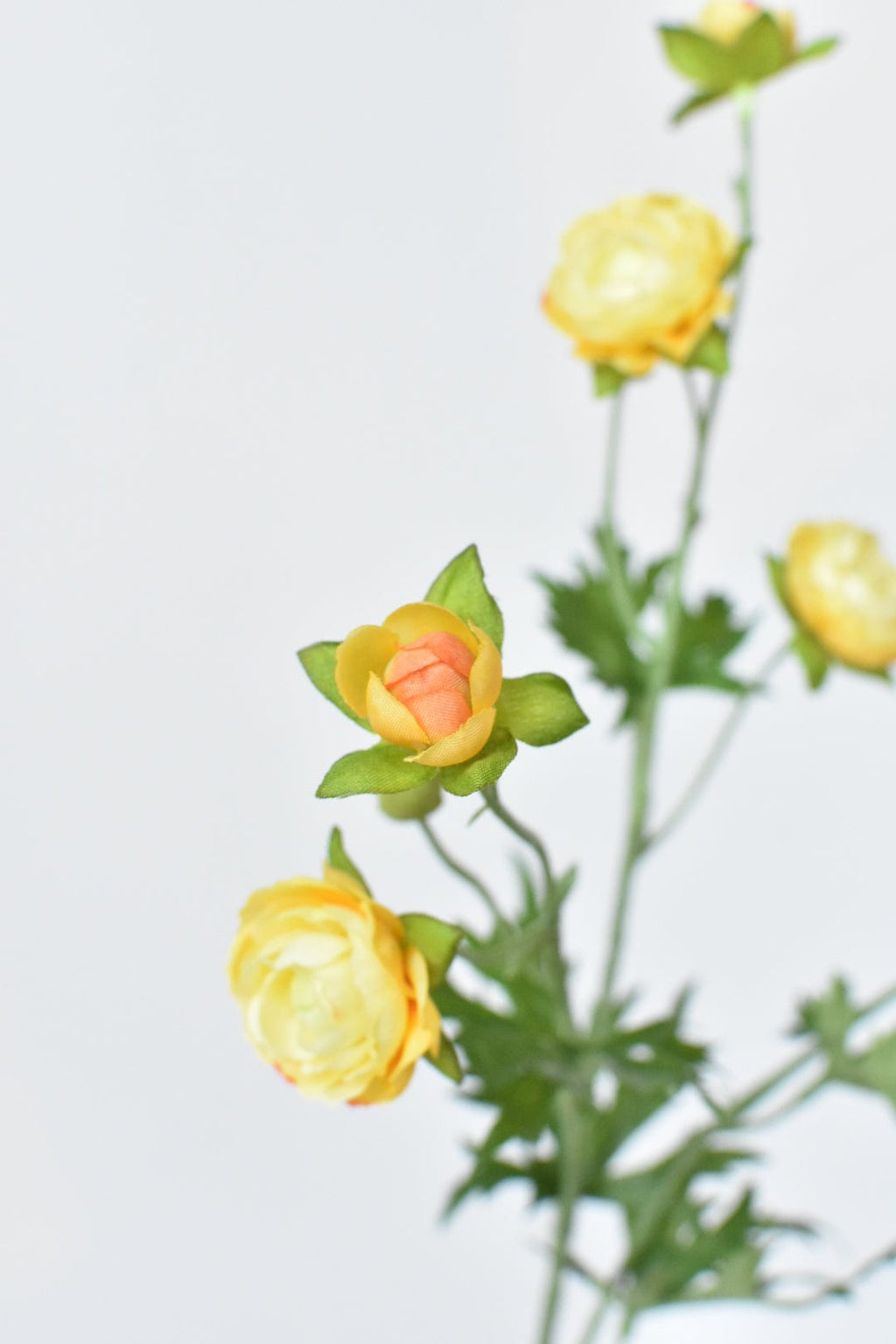 22" Faux Mini Yellow Ranunculus Stem
