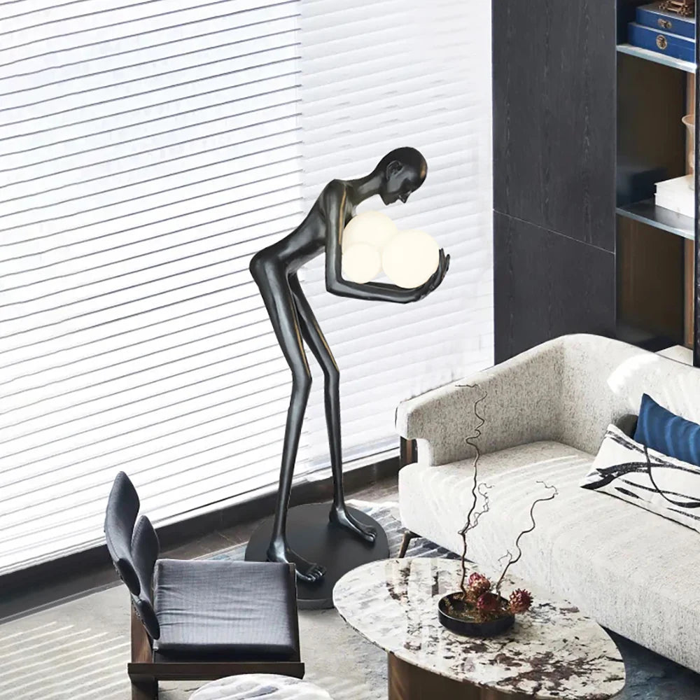 Figure Holding Ball Sculpture Floor Lamp