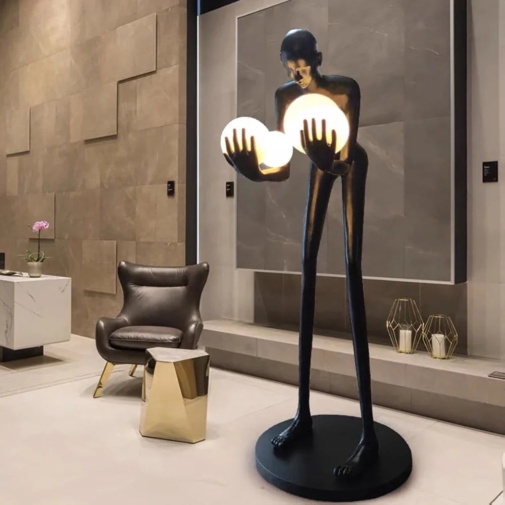Figure Holding Ball Sculpture Floor Lamp