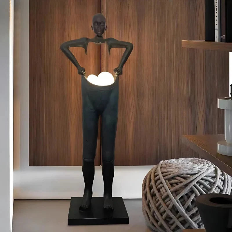Man Carrying Pants Statue Floor Lamp