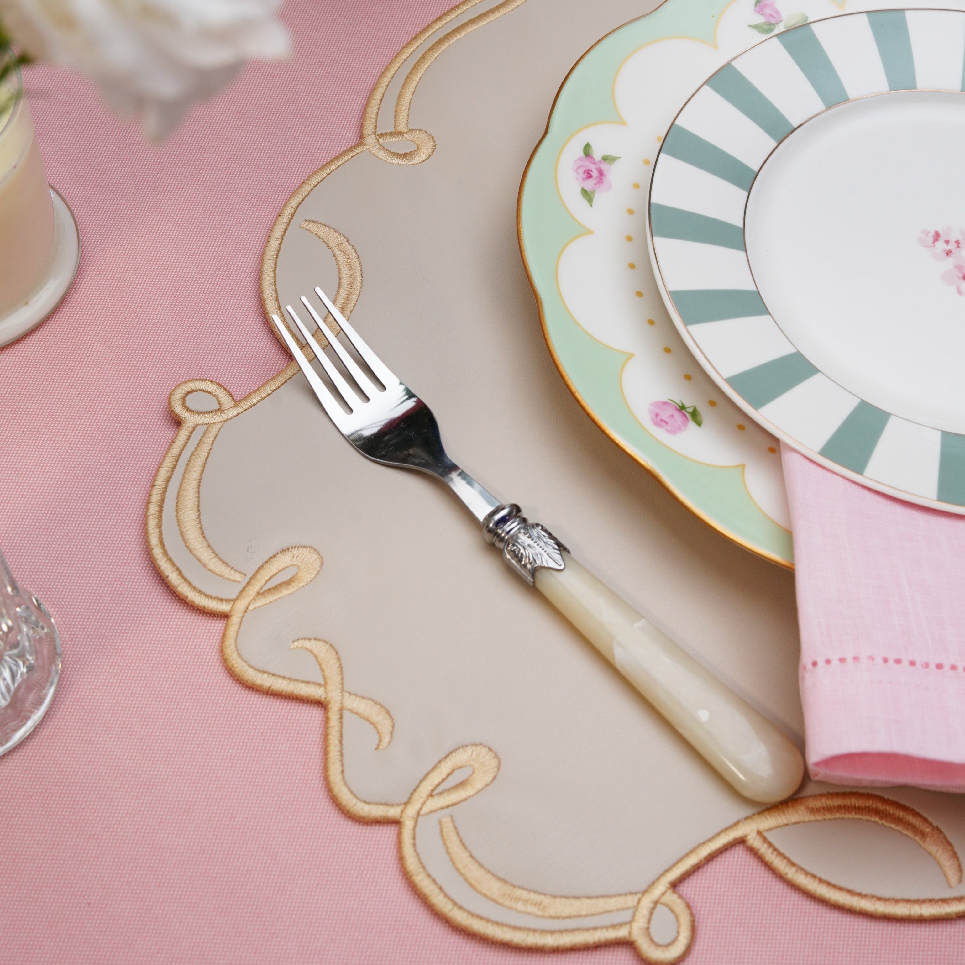 CELESTIA BEIGE OVAL FAUX LEATHER PLACEMAT & COASTER SET (Set Of 4)