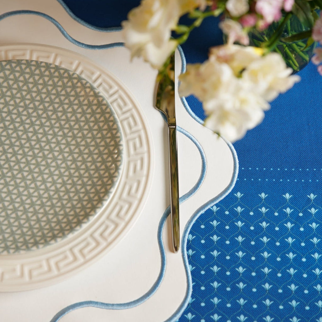 HAVEN WHITE WAVY EDGE BLUE TRIM FAUX LEATHER PLACEMAT (Set Of 4)