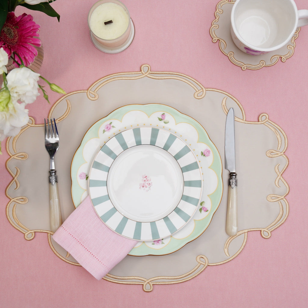 CELESTIA BEIGE OVAL FAUX LEATHER PLACEMAT & COASTER SET (Set Of 4)