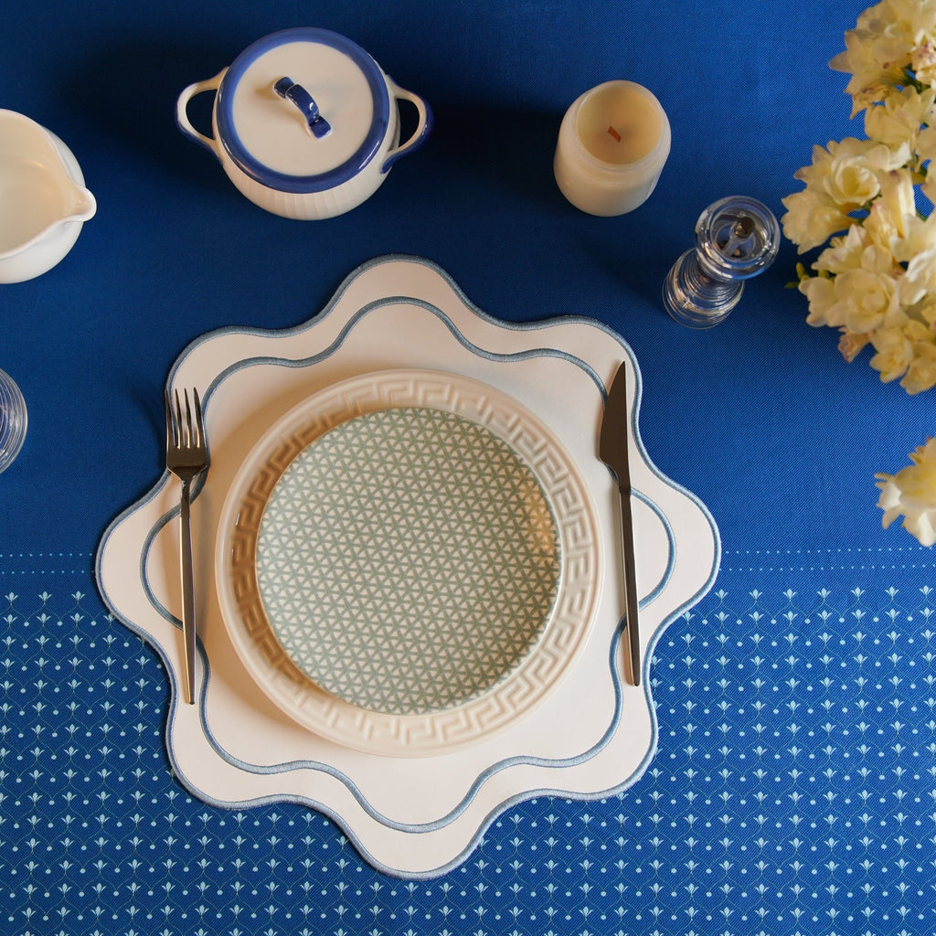 HAVEN WHITE WAVY EDGE BLUE TRIM FAUX LEATHER PLACEMAT (Set Of 4)