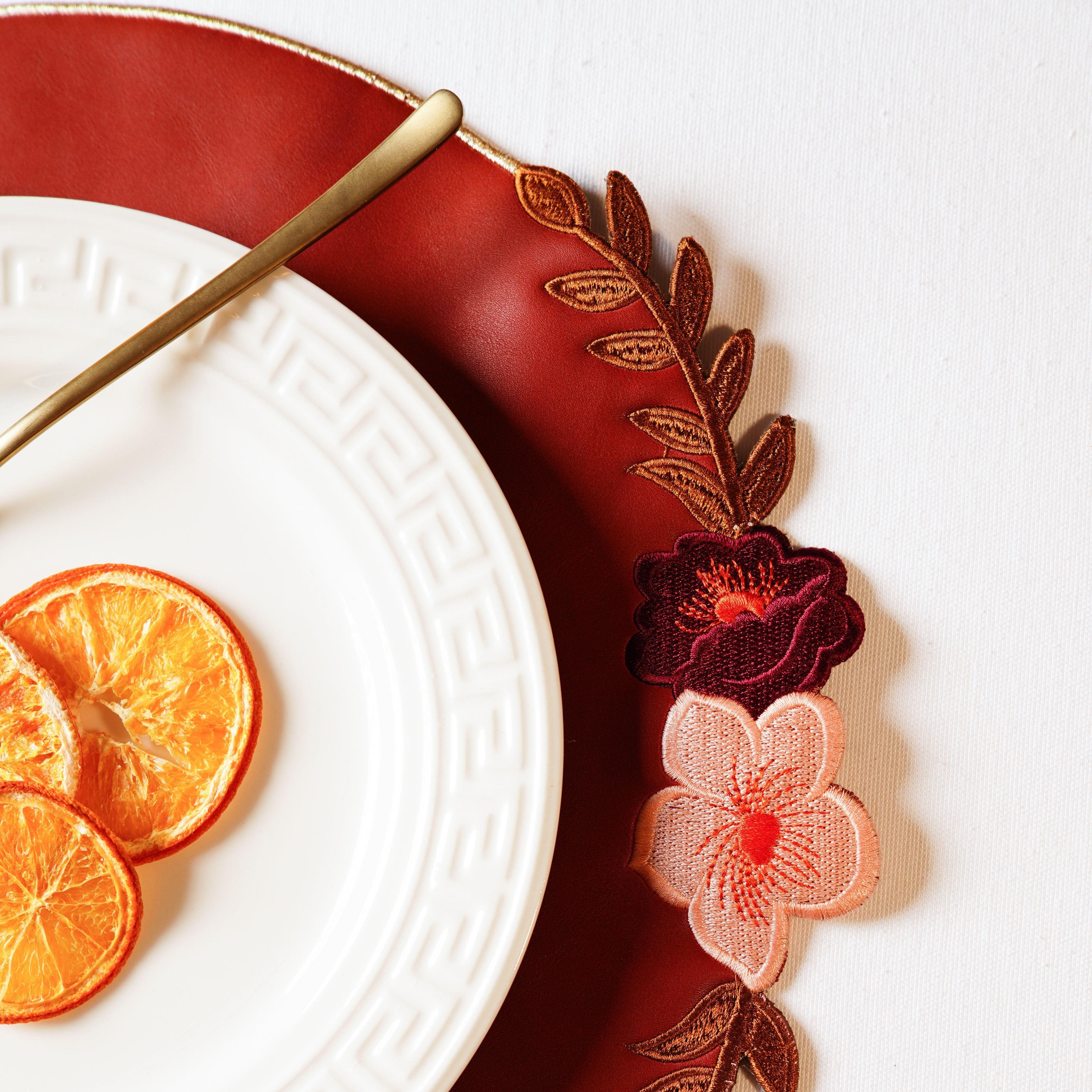 JASMINE DARK ORANGE ROUND FAUX LEATHER PLACEMAT (Set Of 4)